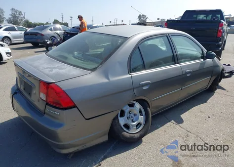 2004 Honda Civic Hybrid from USA, damaged, VIN JHMES96604S022802